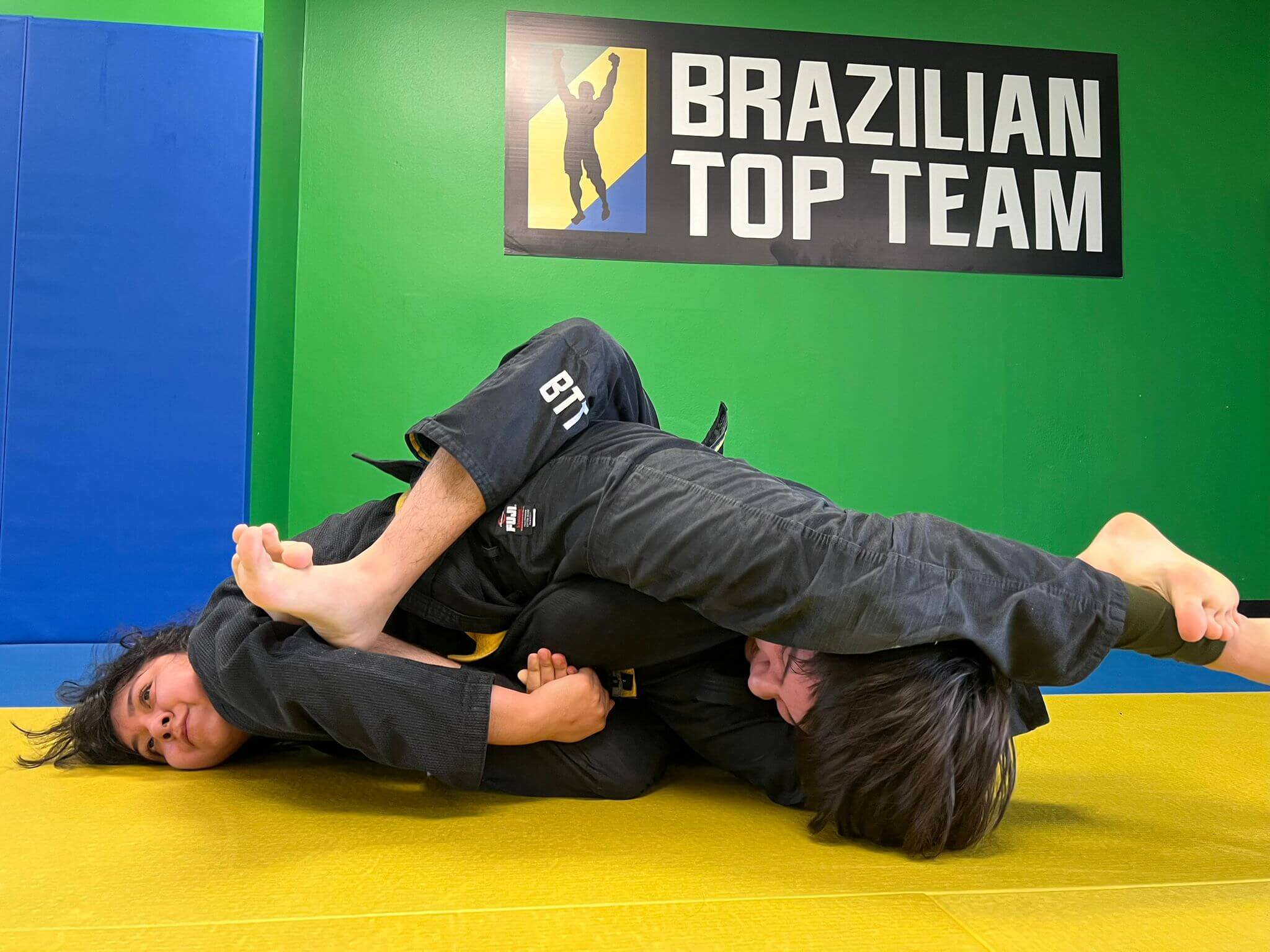 Teen students sparring during Strong Axes BJJ class